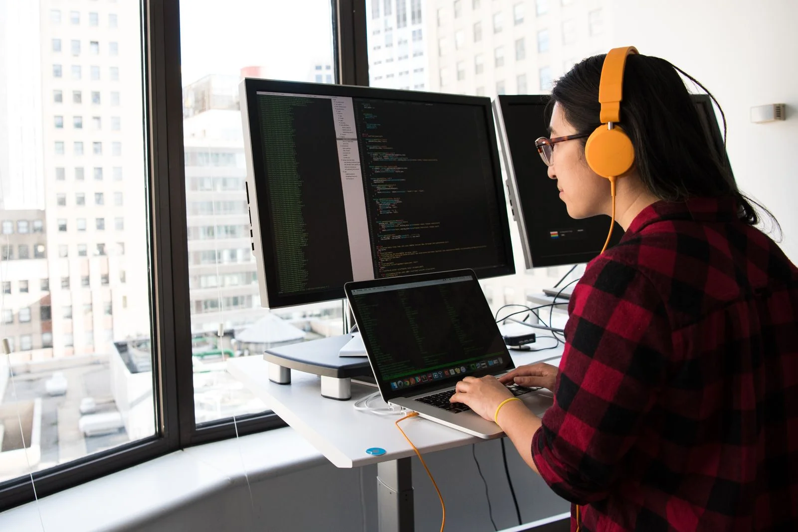 Trust Rank Marketing developer building a site at her desk